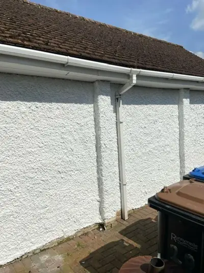 Freshly painted roughcast render wall