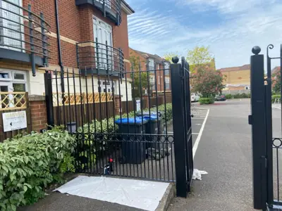 Black metal gates repainted