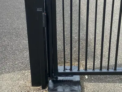 Black metal gates repainted