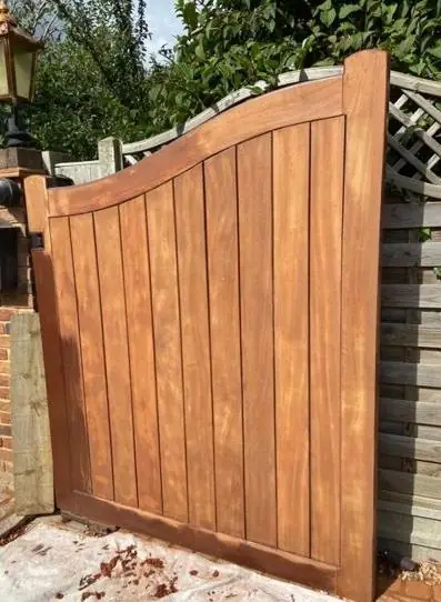 Hardwood gate stained to a rich finish