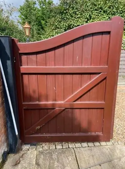 Hardwood gate stained to a rich finish