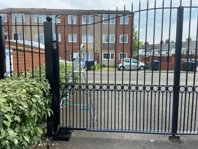 Black metal gates repainted