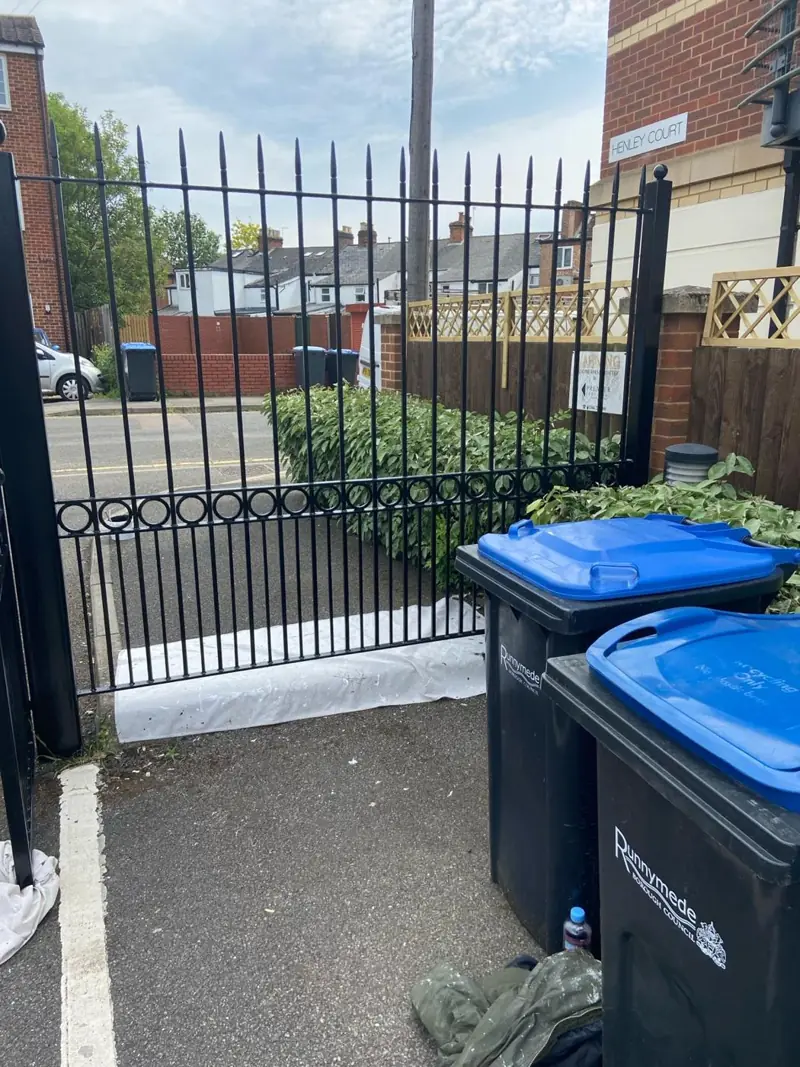 Black metal gates repainted