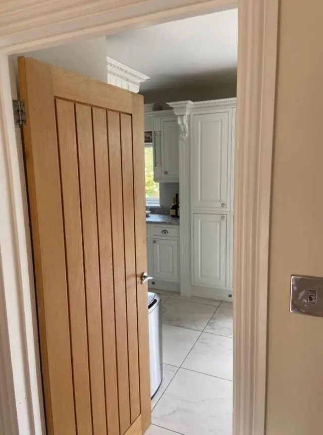 Oak door and freshly painted hallway